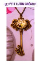 Collier "cabochon horloge sur clé"