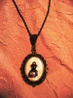 Collier "ourson + perle"